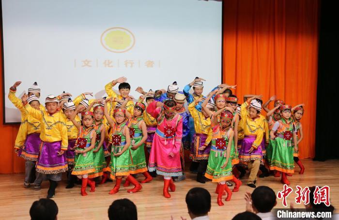 圖為蘭州大學(xué)文化行者團(tuán)隊走進(jìn)民族社區(qū)，開展系列活動。(資料圖)蘭州大學(xué)供圖